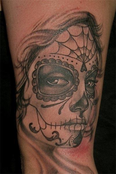 Aztec girl tattoo on inner arm