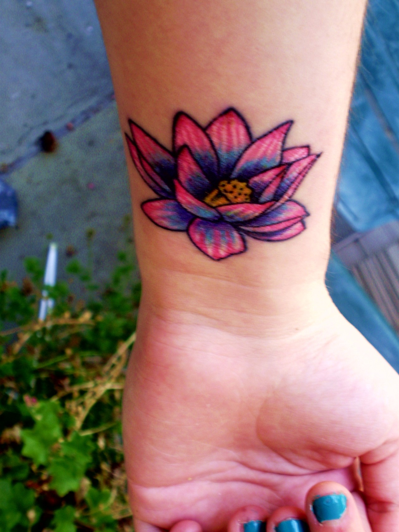 Cool Lotus Flower Tattoo Near Wrist