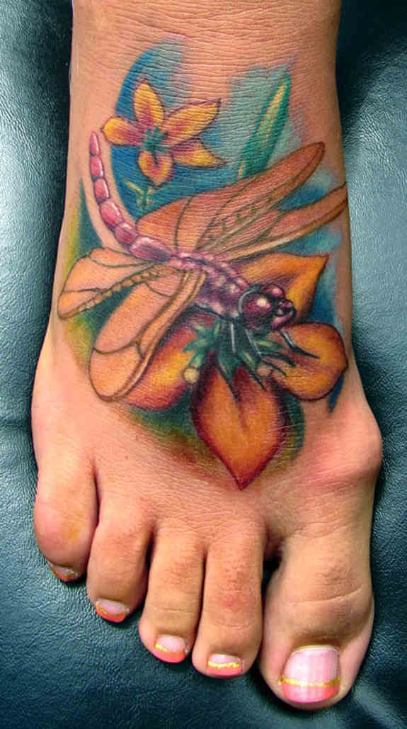 Dragonfly tattoo on foot