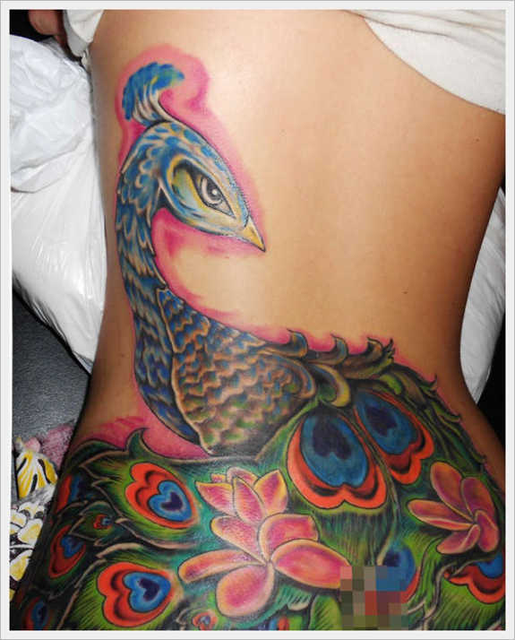 Peacock lower back tattoos