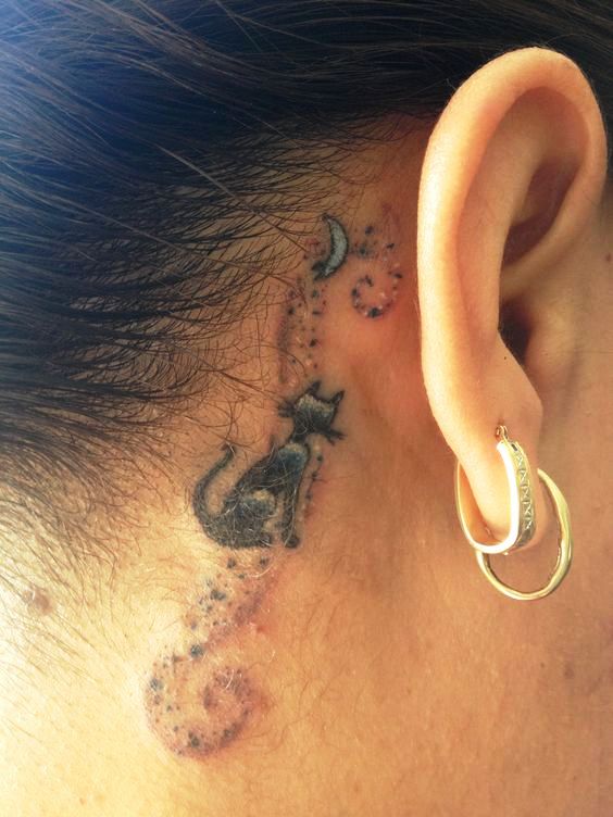 Small behind the ear cat tattoo, Just got this today