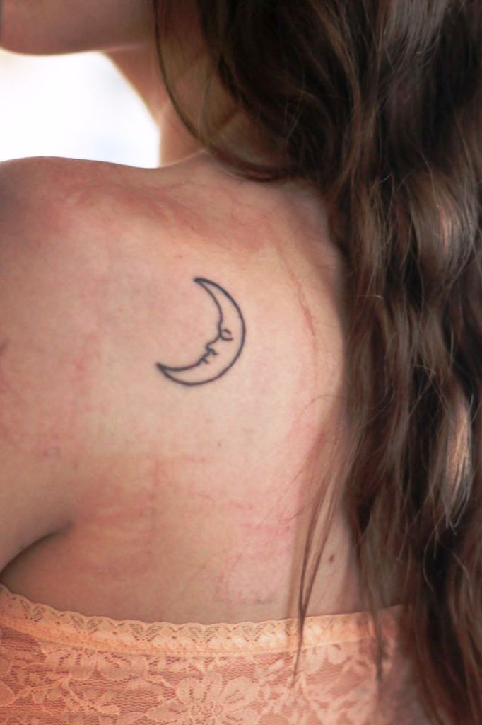 Small color tattoo with a moon