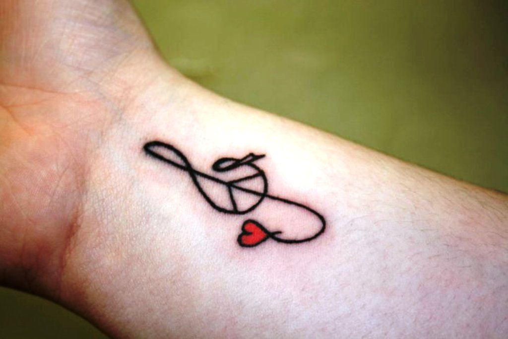 Tiny-Heart-And-Music-Note-Tattoo-On-Inner-Wrist