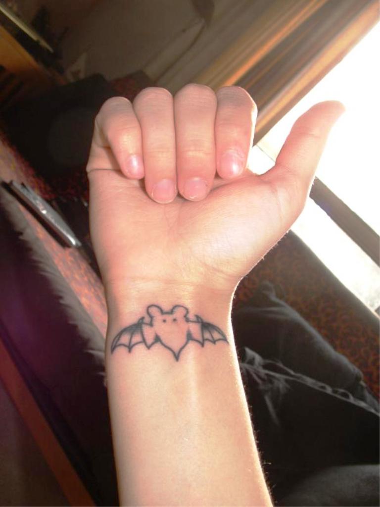 beautiful-small-bat-tattoo-on-wrist