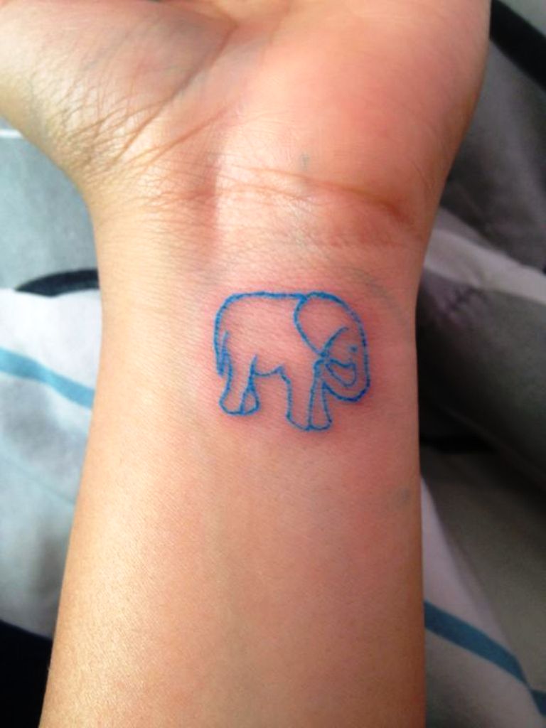 elephant tattoo on my ankle LOVE THE BLUE! _ Tattoos