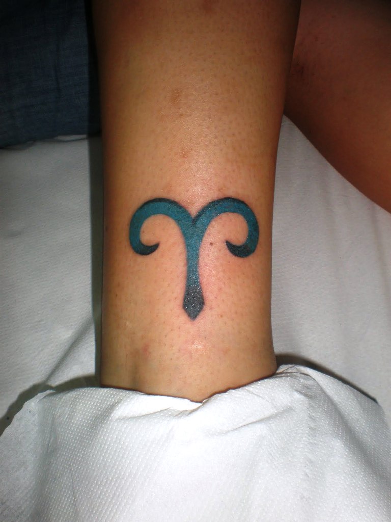 small-aries-symbol-tattoo