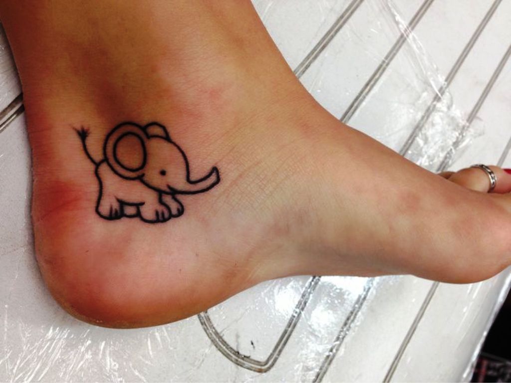 small-outline-cute-elephant-tattoo-on-heel