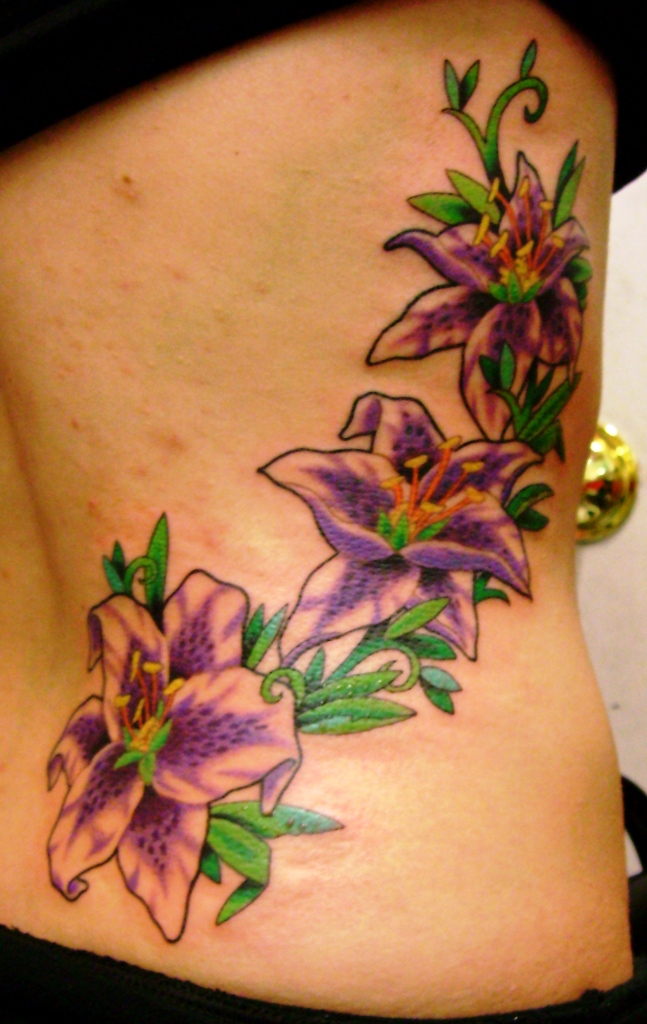 Beautiful-Flower-Side-of-Ribs-Tattoos-for-Women