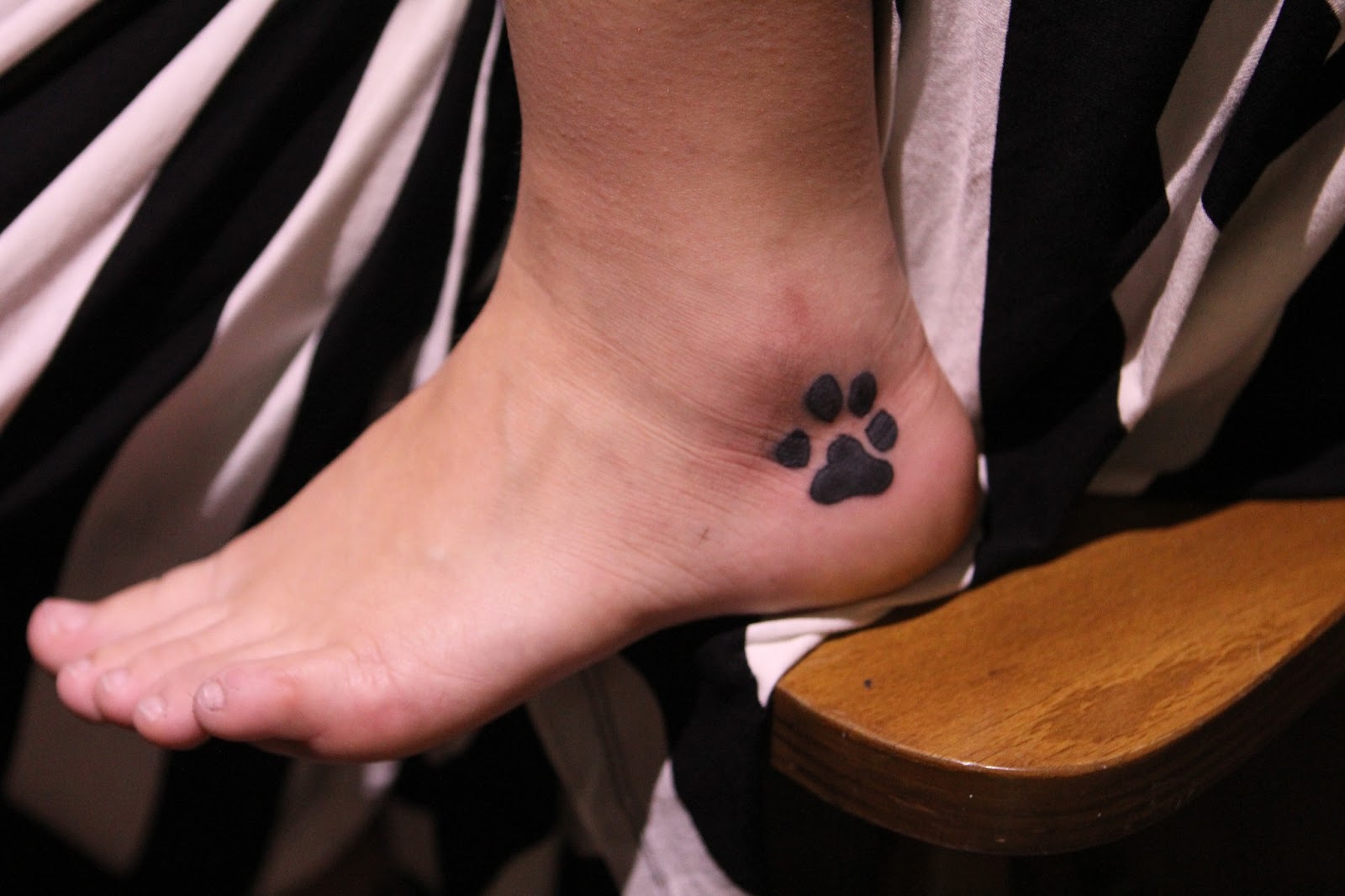 Paw-Print-Tattoos-On-Foot