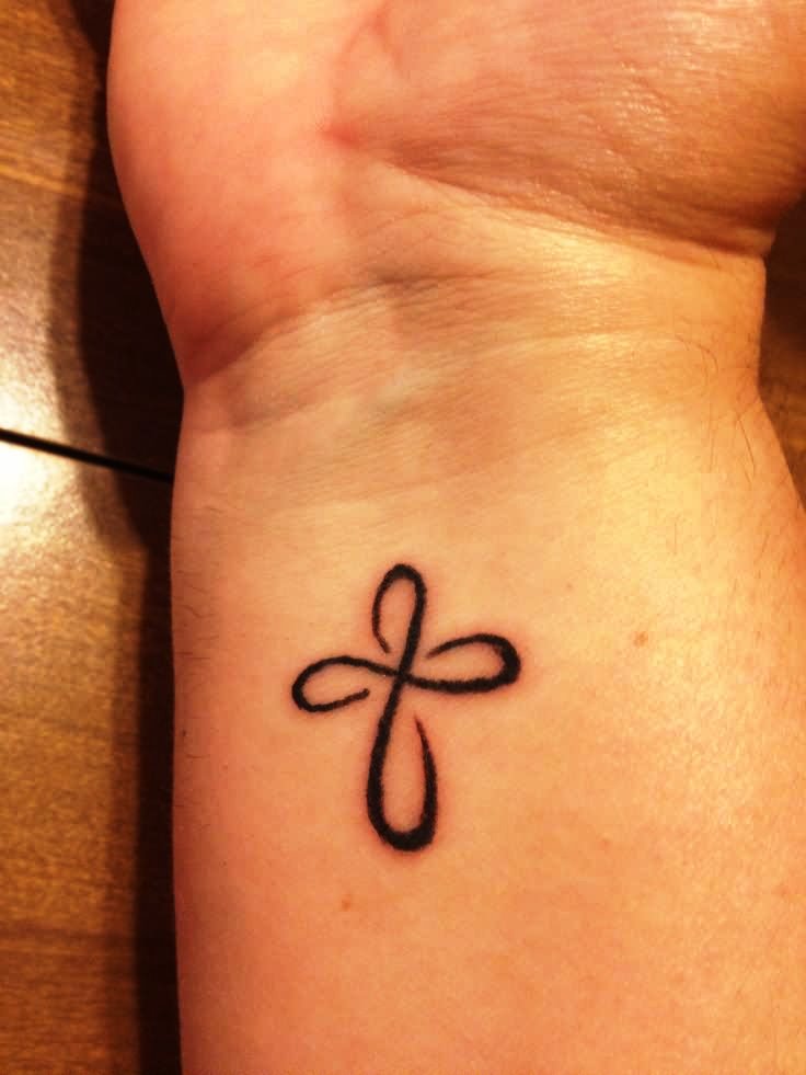 Small-Cross-Tattoo-On-Wrist