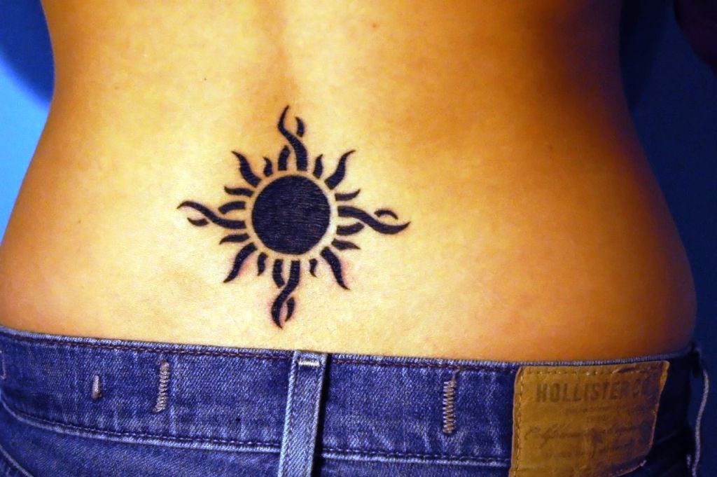 Sun-Tattoo-Design-on-Lower-Back-for-Women
