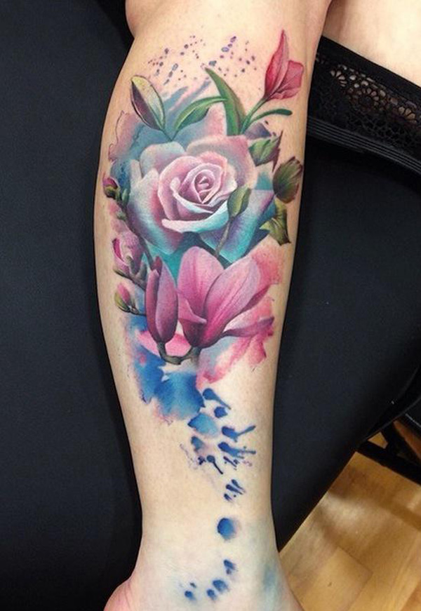 Watercolor magnolia and rose tattoo
