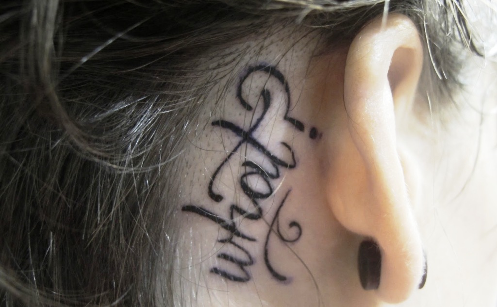 behind-the-ear-word-tattoo