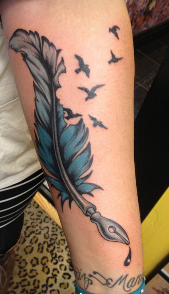 feather tattoo on forearmfor women