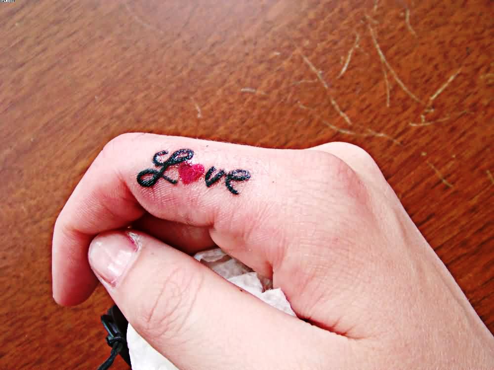 small-love-tattoo-on-finger