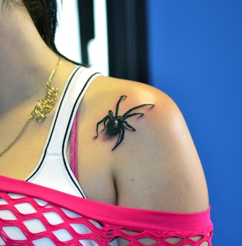 small_black_spider_tattoo_on_shoulder_for_girls