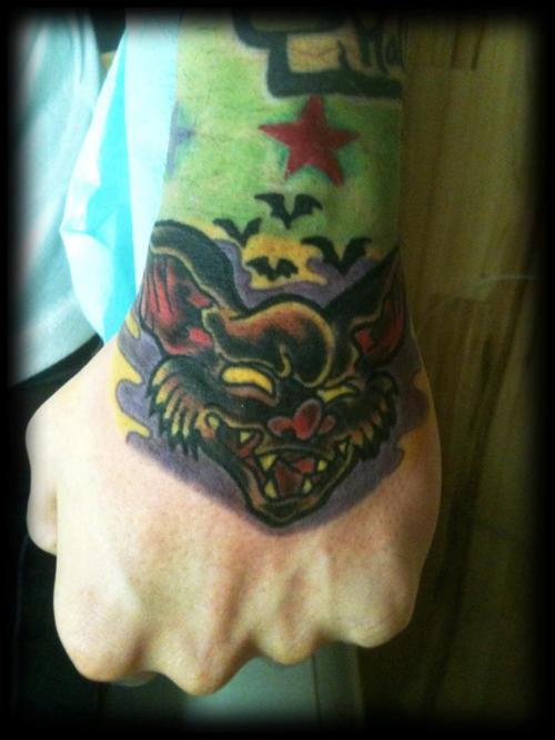 angry-wolf-head-tattoo-on-hand