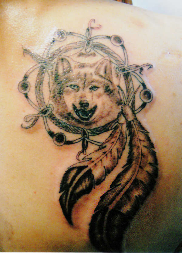 catcher-wolf-tattoo-designs