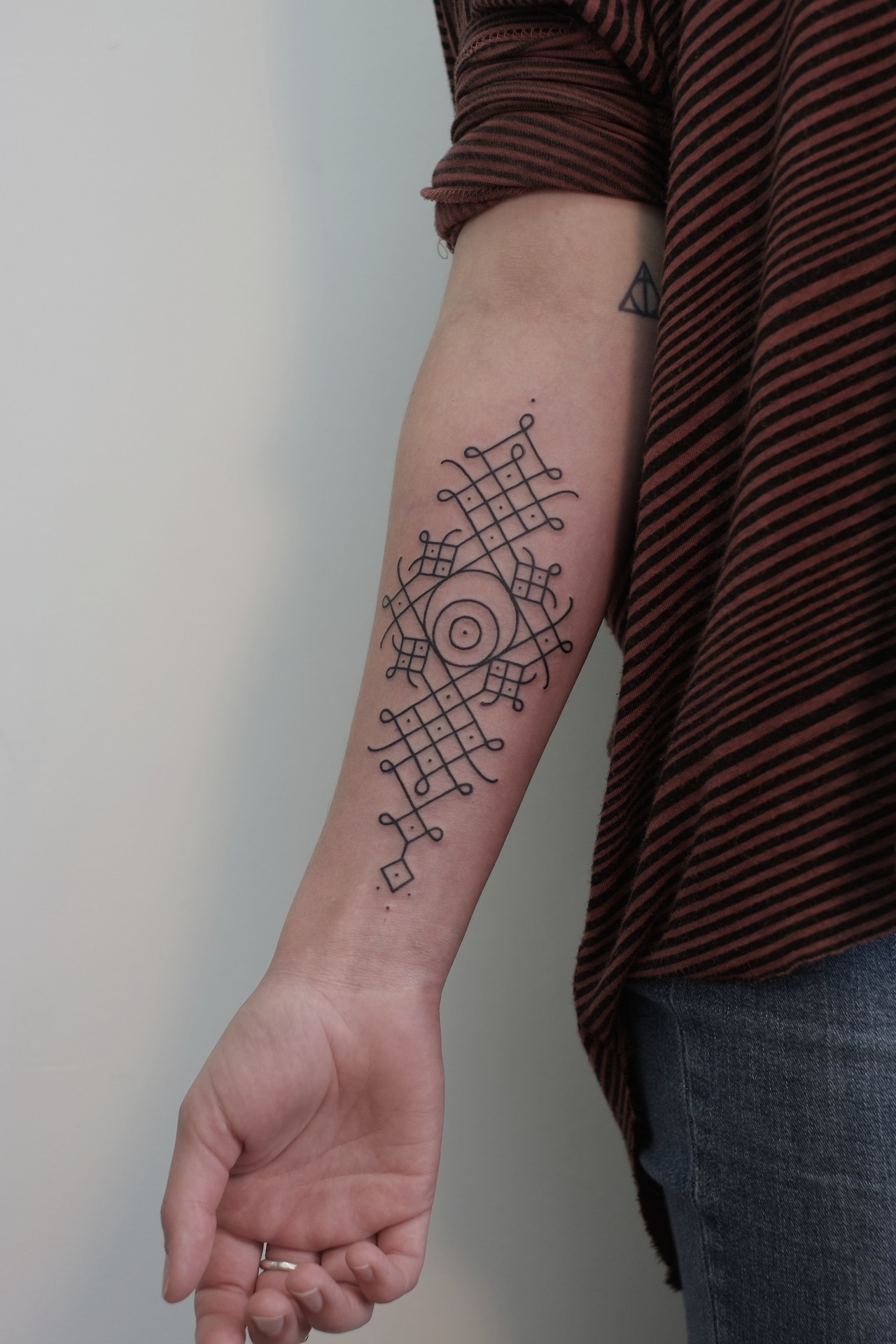 geometric-tattoo-on-arms-design