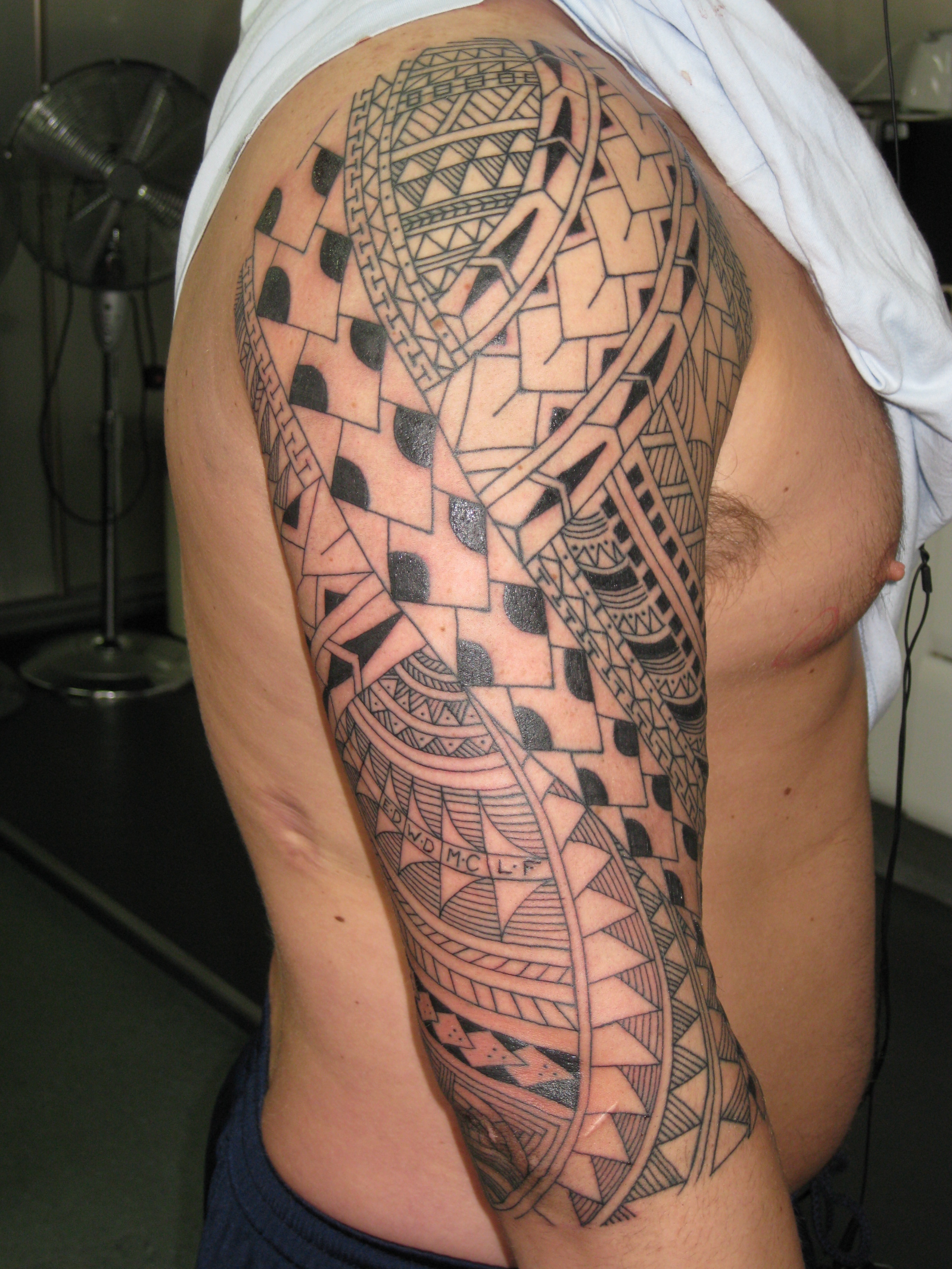 geometric-tattoo-sleeve-fine-design
