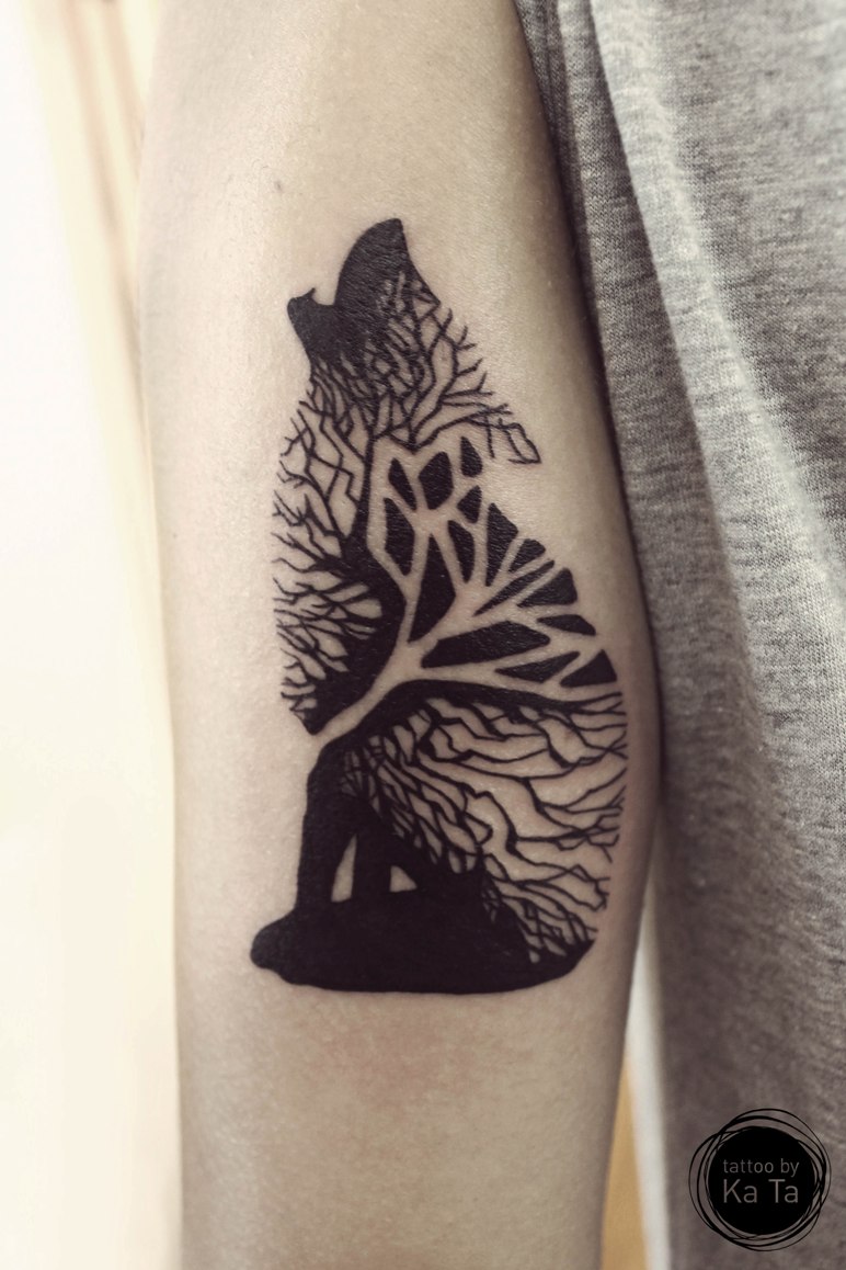 geometric-wolf-arm-tattoo