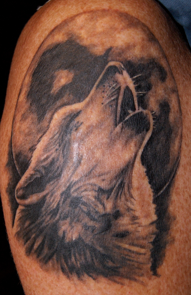 howling-wolf-tattoo-half-sleeve