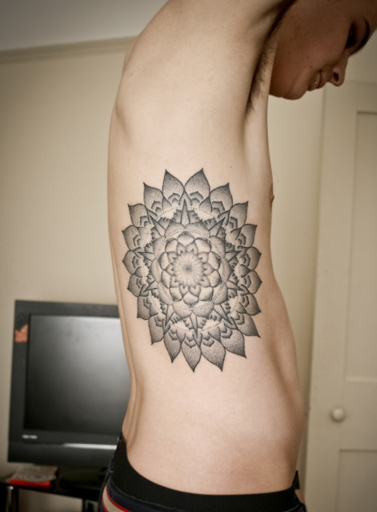 mandala-tattoo-on-side-rib