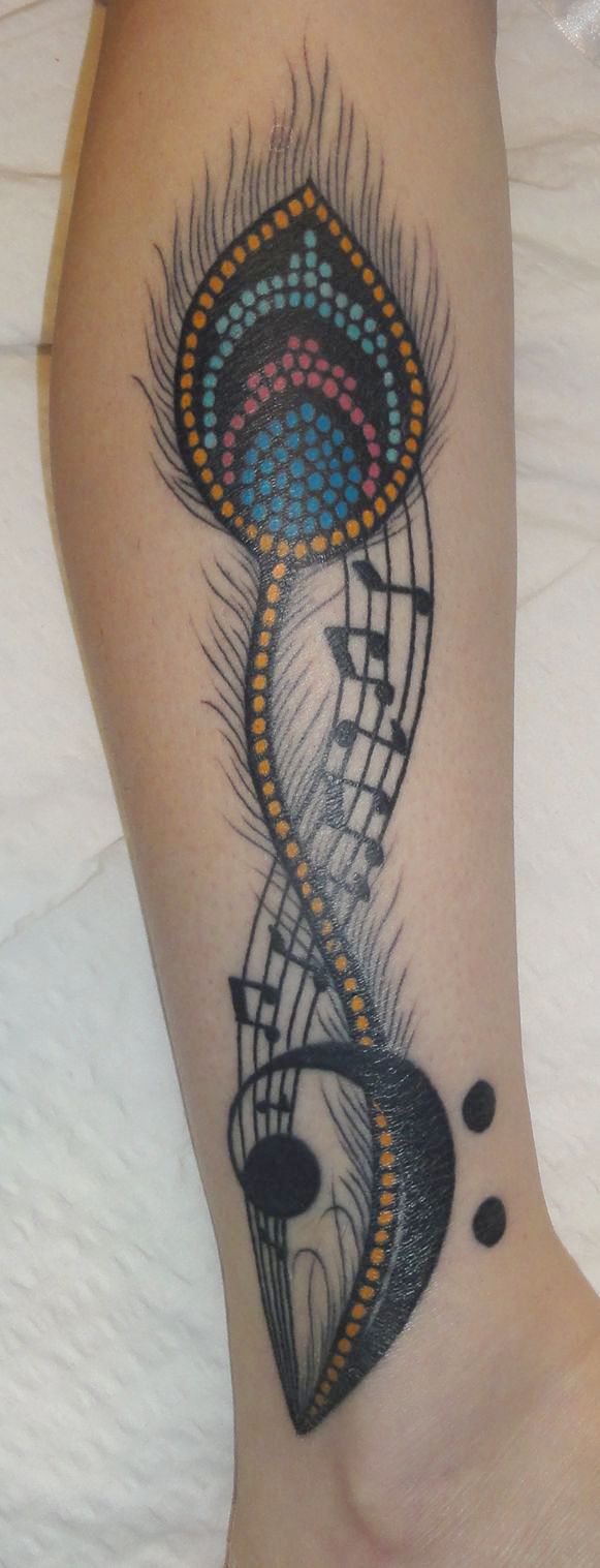 music-notes-and-peacock-feather-tattoo