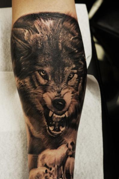 realistic-wolf-tattoos-arm-idea
