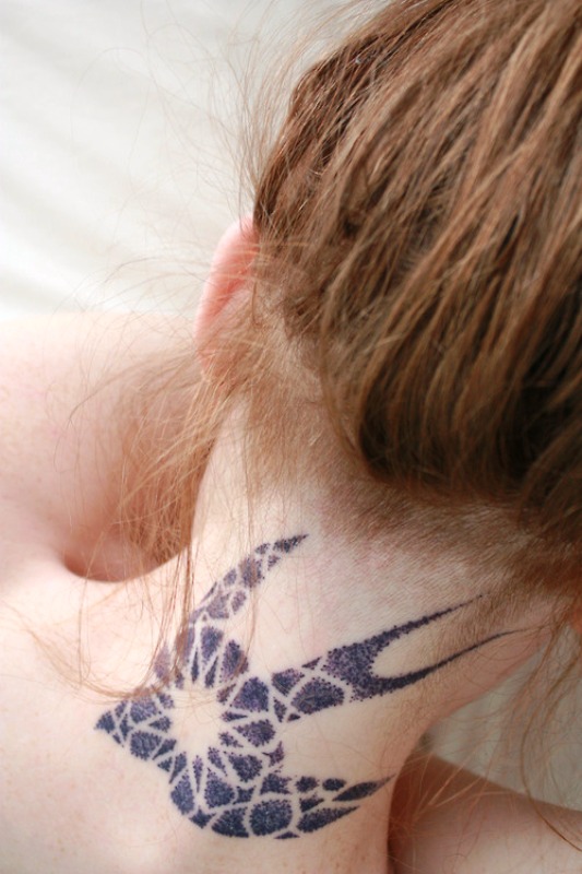 sparrow-tattoo-on-back-of-neck