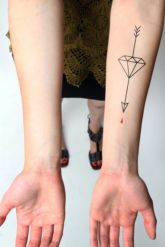 the-arrow-tattoo-on-forearm