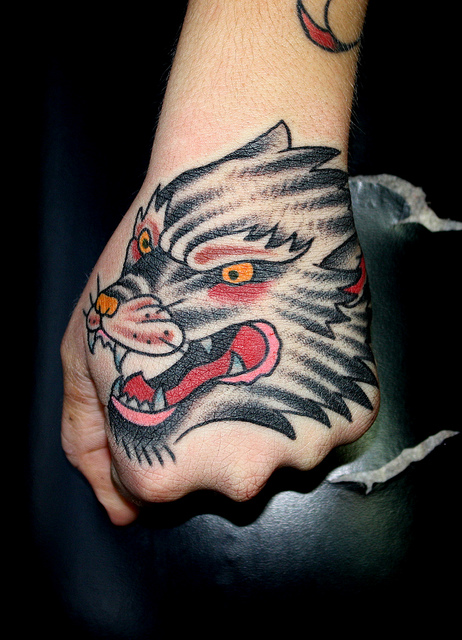 traditional-wolf-head-tattoo-on-hand