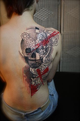 trash-polka-skull-tattoo-back