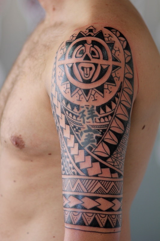 tribal-arm-sleeve-tattoo-designs
