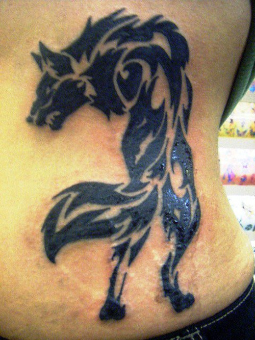 tribal-wolf-tattoos-for-men-on-rib