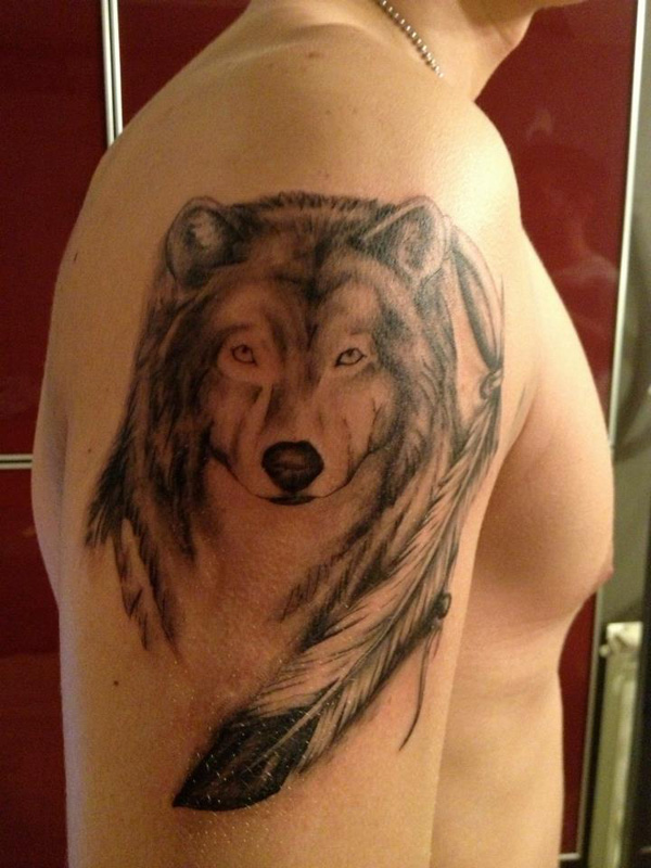 wolf-feather-tattoo-arm