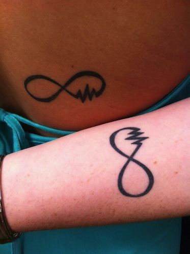 Infinity Sign with Paw Prints Tattoo