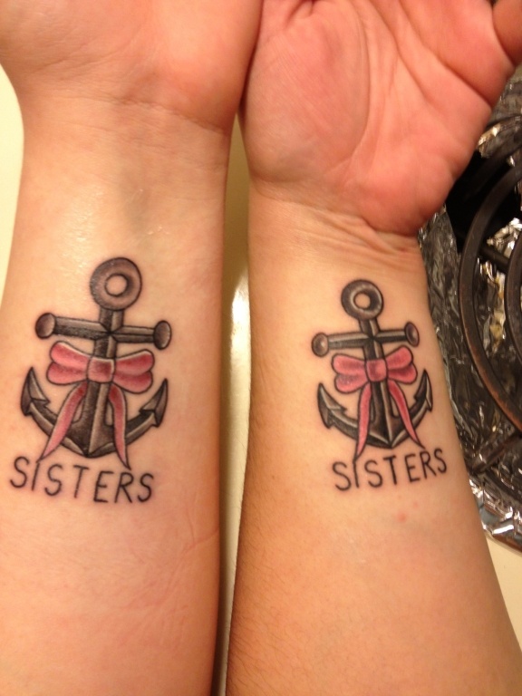 Matching sister tattoo