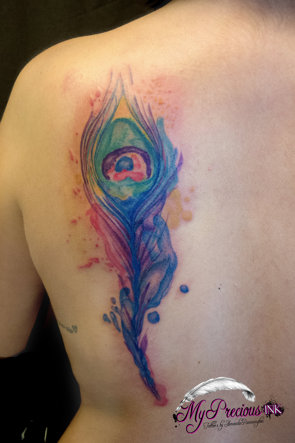 Watercolor Peacock Feather Tattoo